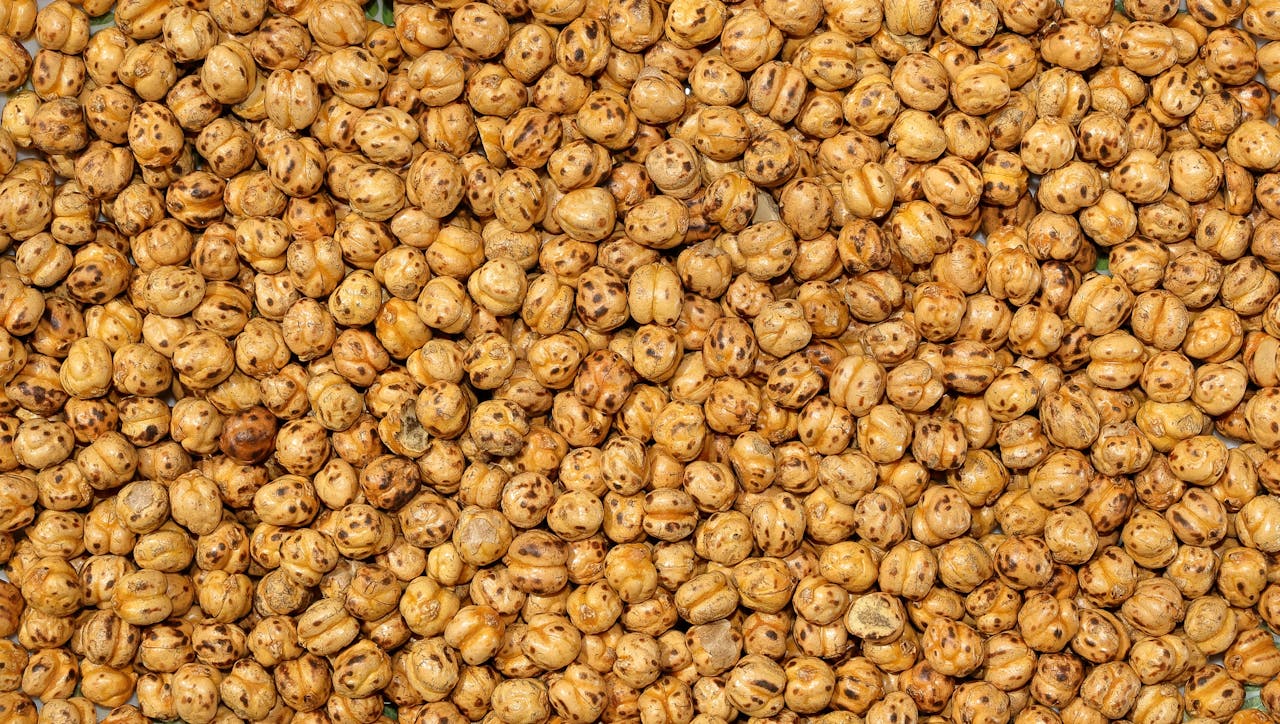 gallery-6 Detailed texture of roasted chickpeas perfect for food background and texture.