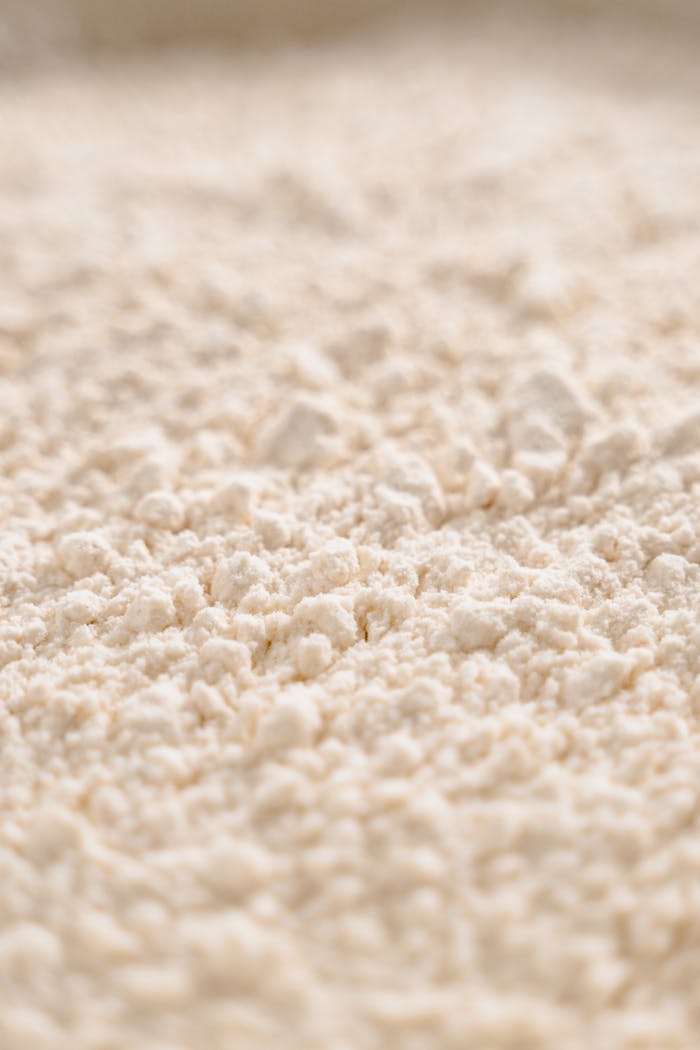 gallery-3 Close-up image of white flour texture, showcasing its fine, powdery consistency.